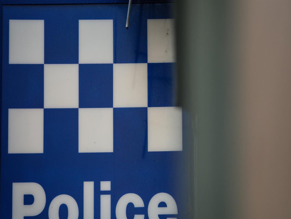  Two police officers charged with assault 