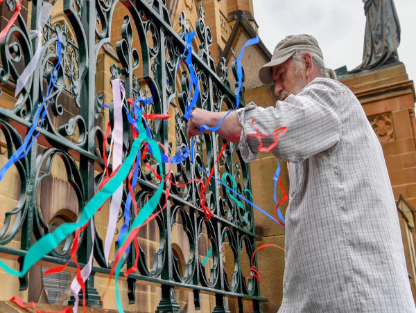 Cardinal Pell lies at cathedral as controversy lingers