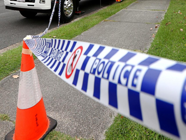 Woman's body found in grass by neighbour mowing yard