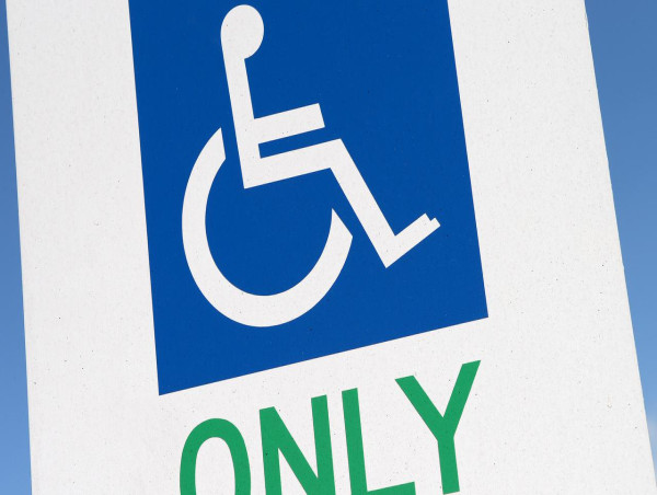 Taxi company charged over deaths of wheelchair users