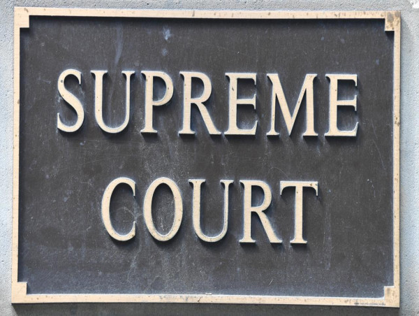Son jailed for 29 years for mum's ferocious murder