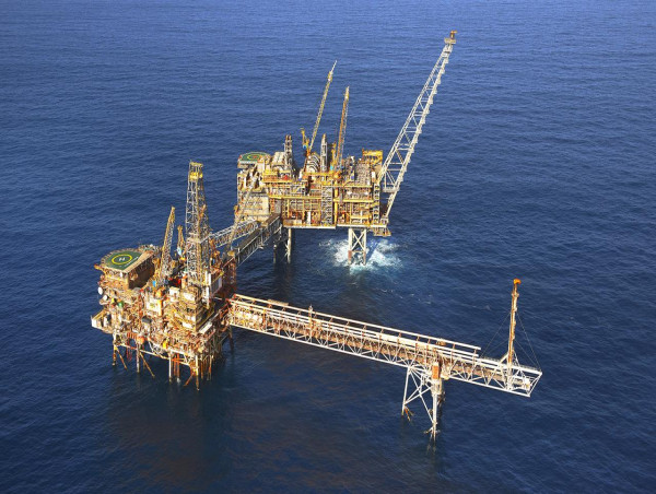  Energy crisis, merger fuels higher Woodside profit 