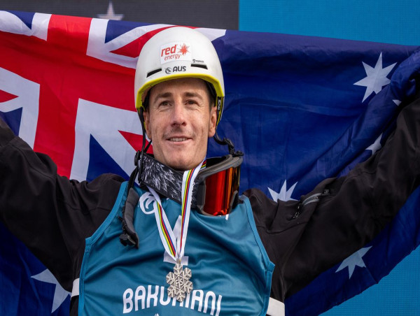 Graham defied broken collarbone to win world ski medals
