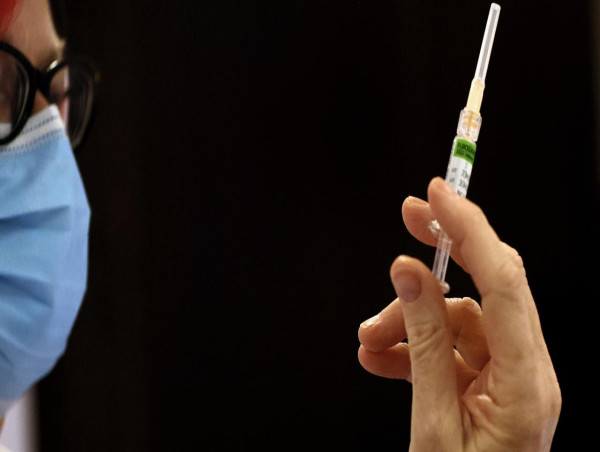 Flu surges 100-fold, more children in hospital