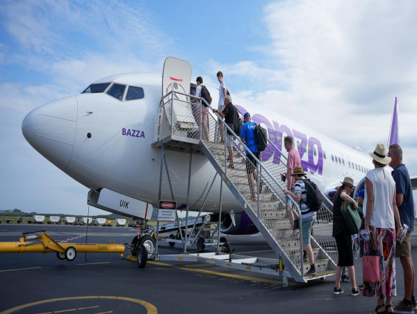 Airfare prices flying high but descent in sight