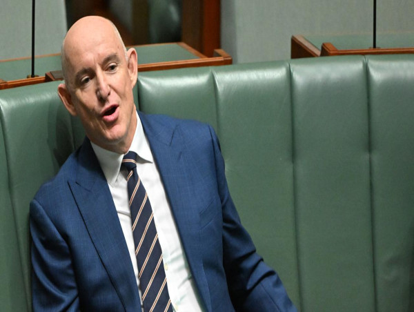 Former minister denies wrongdoing after contract review