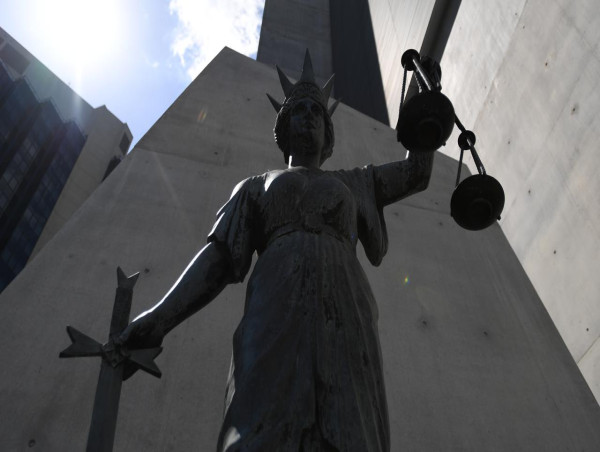 Woman accused of shooting two people denied bail