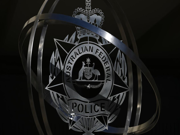 Man charged over embassy bomb threats