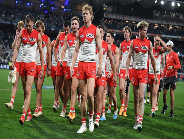 Longmire lashes Swans' effort in crushing loss to Cats