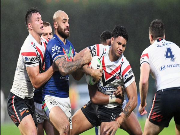  Roosters outmuscle Warriors in rain-soaked NRL contest 
