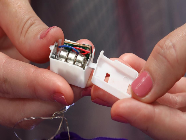 Major retailers fined over button battery products
