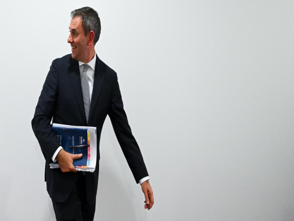 Treasurer Chalmers plays down second surplus prospect