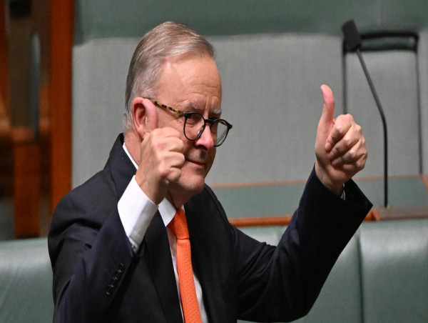 PM defends budget spending, denies inflation fears