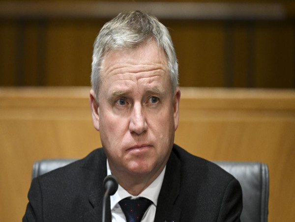  Libs in minority government as MPs quit over stadium 