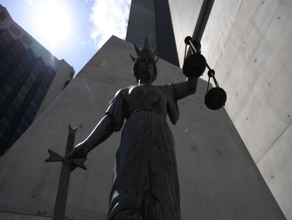  Fourteen in court over death of 8yo diabetic girl 