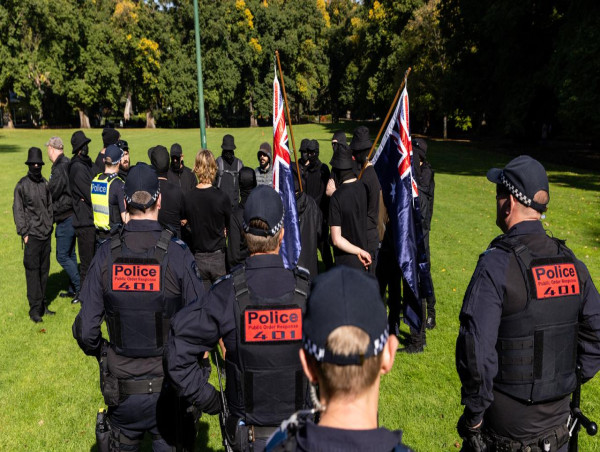 Two men charged after violent neo-Nazi protests