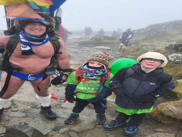  Six-year-old climbing 12 mountains for ‘poorly children’ takes on final hike 