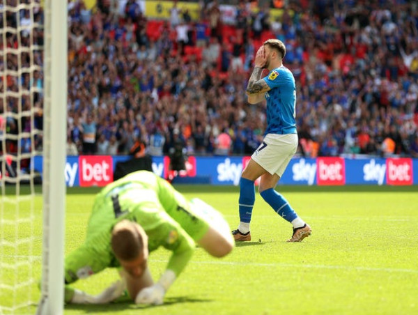  Carlisle promoted to League One after shootout victory over Stockport at Wembley 