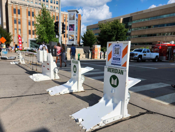  ALL EYES ON MERIDIAN BARRIERS AT APPLETON MILE OF MUSIC FESTIVAL 