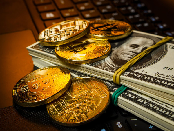  Crypto traders eye Bitbot launch as top economist says ETFs are a “game-changer” 