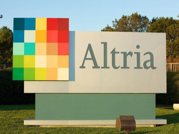 Altria cuts stake in AB InBev, shares dip amid secondary offering