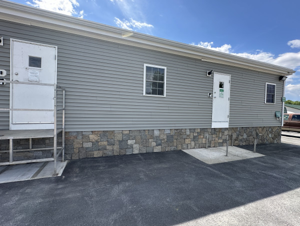  JS Masonry Transforms Stoneyard's Sales Trailer with Thin Stone Veneer 