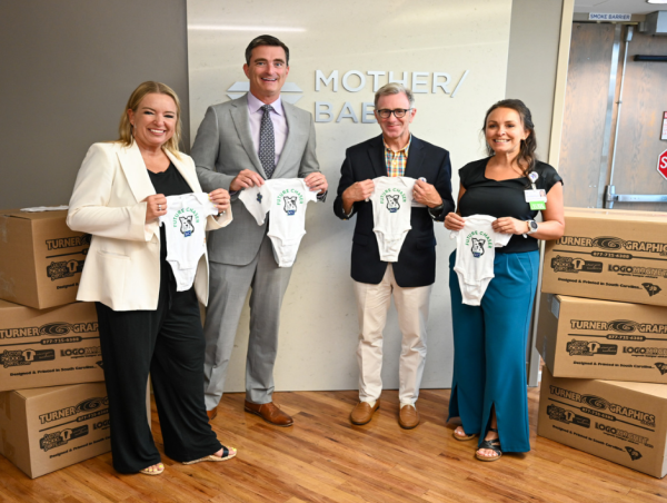  Spartanburg Community College Donates Almost $23,000 of Chaser Onesies and Hats to Spartanburg Medical Center 