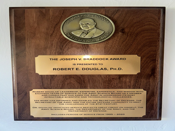 Dr. Robert Douglas is honored by the Army Science Board with the Dr. Joseph V. Braddock Award