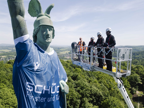 Main Sponsor Schüco Thrilled By Sporting Success Schüco Dresses Germany's Tallest Statue In A Football Jersey Of Arminia Bielefeld