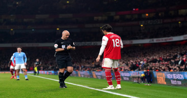 Arsenal and Man City fined for surrounding referee Anthony Taylor