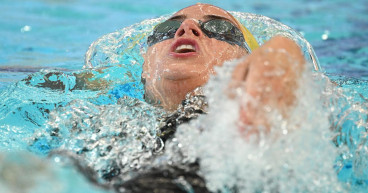 Swim star McKeown breaks 200m backstroke world record