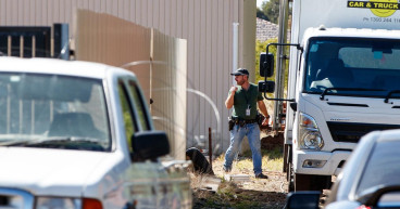 Two charged with murder after police find man's remains