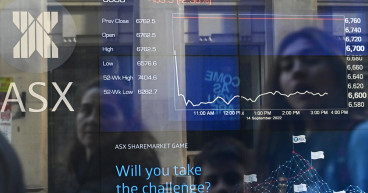 Australian stocks sink into the red on eve of Easter