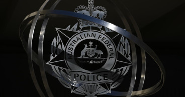 Man charged over embassy bomb threats