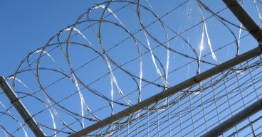 Men who tortured prison guard get more years in jail