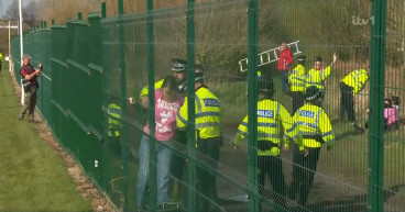  Grand National start delayed after animal rights protesters get on to track 