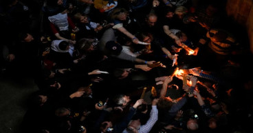Christian faithful celebrate ‘Holy Fire’ under restrictions