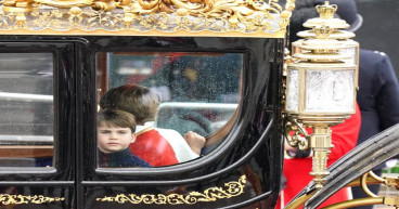 Horse rears backwards into crowds during coronation procession