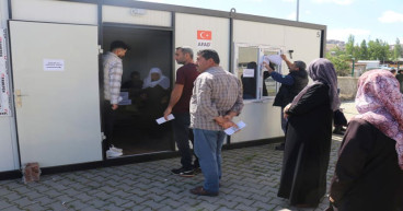 Turkish news agencies offer different partial results from election