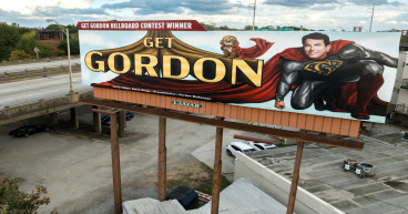 Gordon McKernan Unveils Winning Billboard Design with a Heartfelt Tribute
