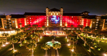 NOV 24 FRIDAY-GRAND GALVEZ INAUGURATES CHRISTMAS TRADITION-LIGHTING 27 PALM TREES ON THE DRIVEWAY AND 50-FOOT-TALL GOBO