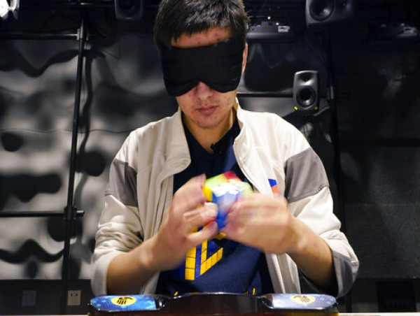 World champion says Rubik's Cube and violin go hand in hand