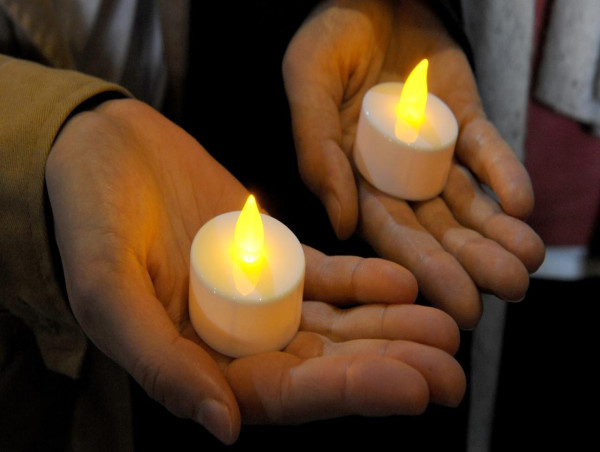  Nation's domestic violence victims remembered in vigil 