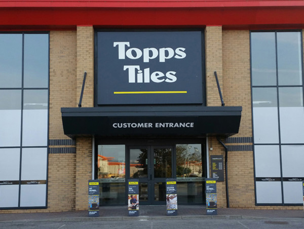  Topps Tiles cautions over sliding sales as annual profits slump 