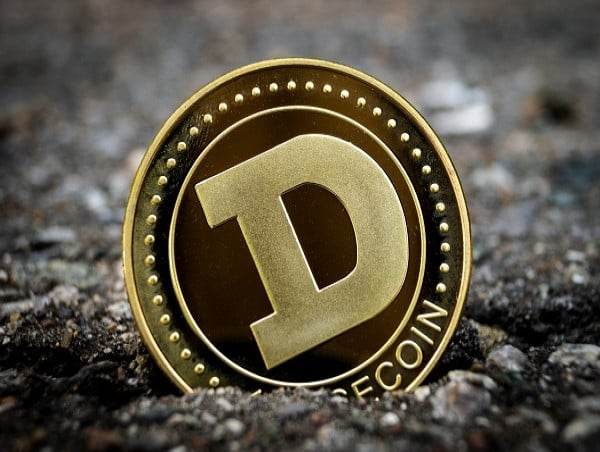  Dogecoin crosses $0.1 with 87% holders in profit on 10th-anniversary surge 