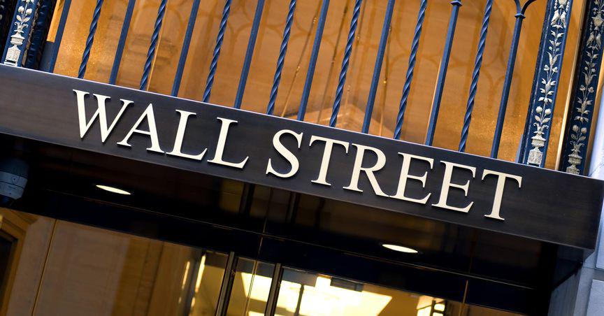  Wall Street declines after hawkish comments; IBM, AT&T surge 