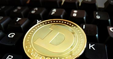 Dogecoin Surging! Should You Buy It Ahead Of Elon Musk's SNL Debut?