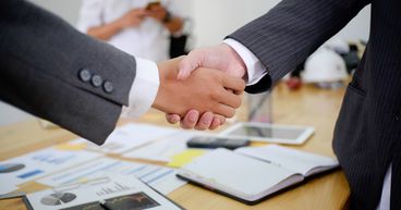 Global dealmaking is booming; and Wall Street is cashing on it