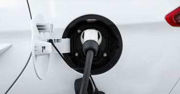 How can I invest in Tesla (NASDAQ:TSLA) stock from Canada?