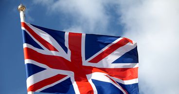 What factors led to a slow growth of UK’s GDP in the third quarter?